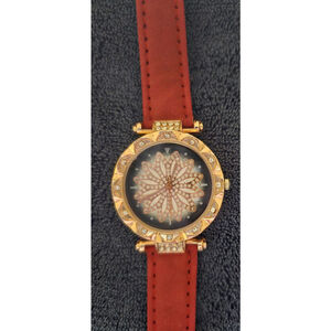 Gold toned watch with rhinestones